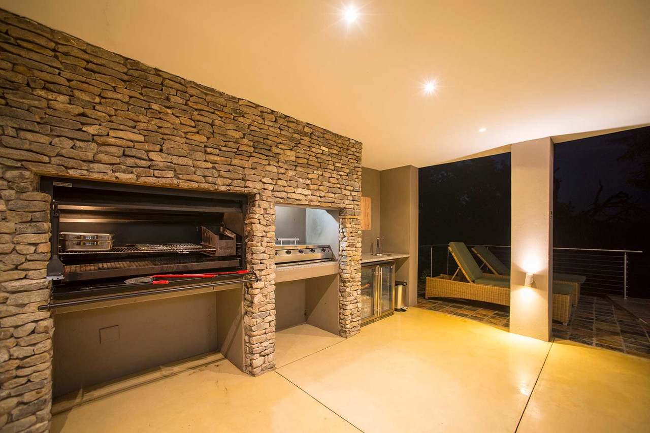 Jetmaster and gas braai in stone surround at night