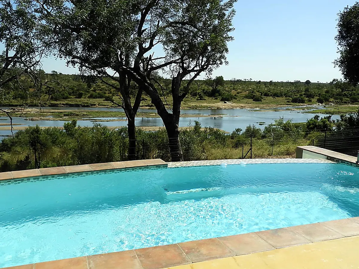 Infinity pool overlooking the Crocodile River at Crocodile Rock River Lodge